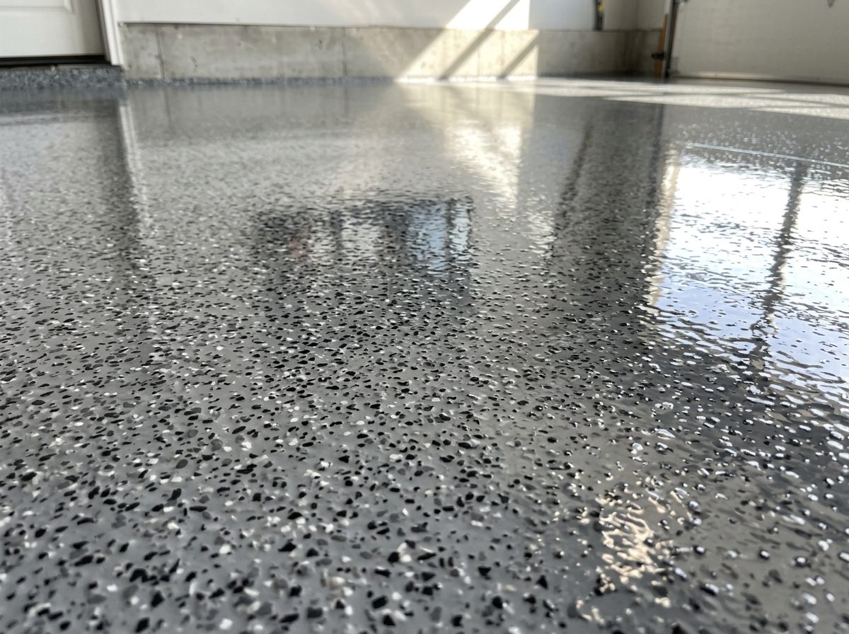 Full-flake epoxy garage floor system with a clear protective topcoat